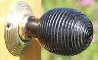 photo of a wooden door handle